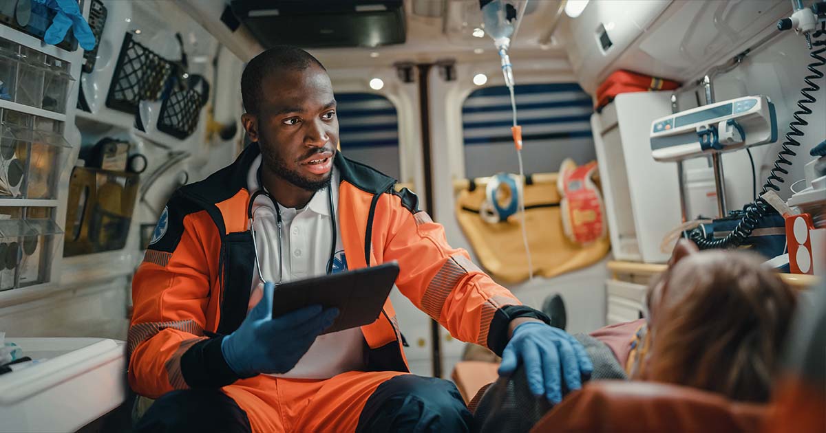 medic-in-amb-comforting-patient