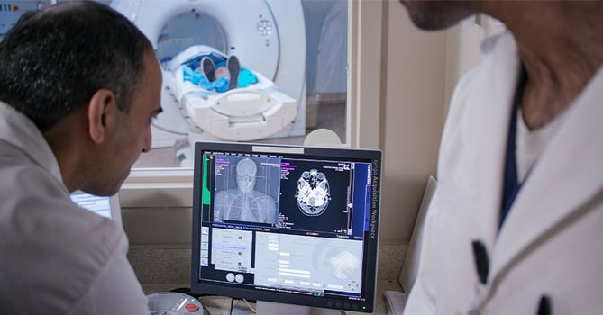 CT-machine-neurologists-patient@900x472