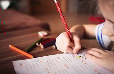 girl-doing-school-600x391