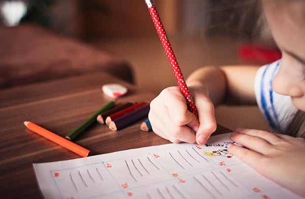 girl-doing-school-600x391