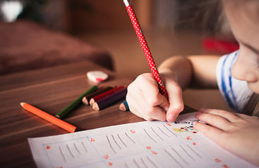 girl-doing-school-600x391