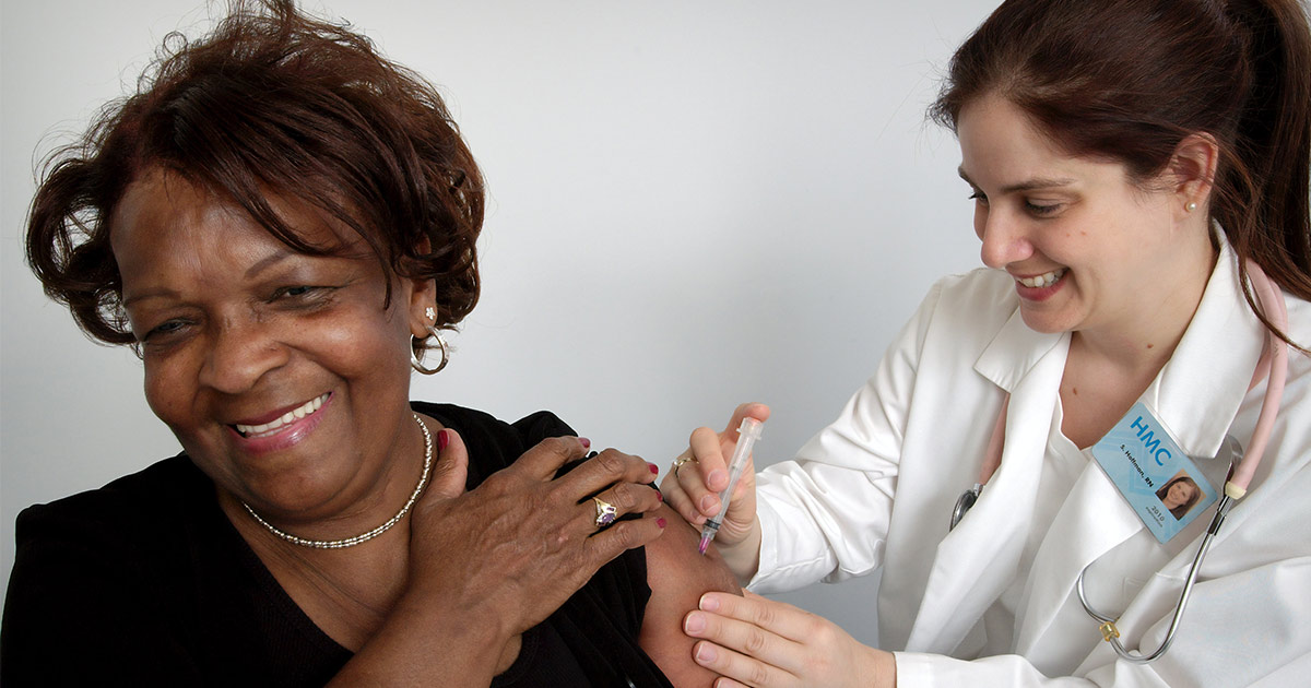 doctor-giving-patient-shot