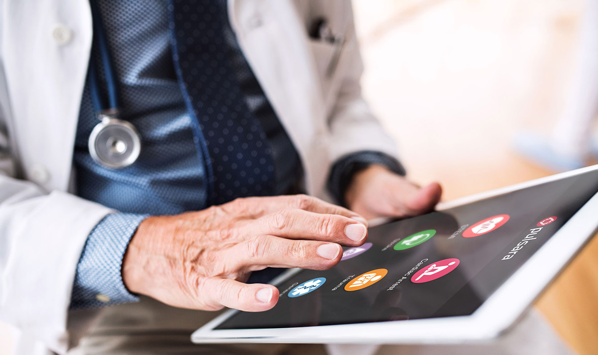 doctor-holding-tablet