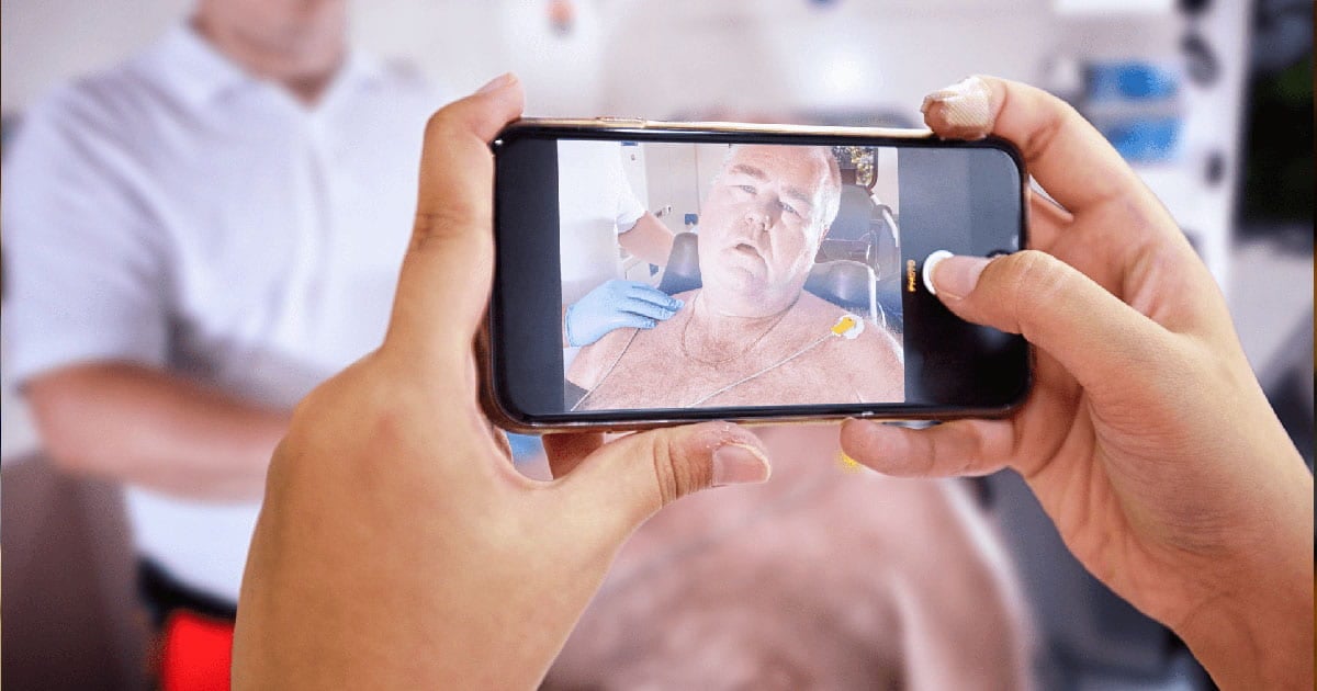 medic-taking-picture-of-patient