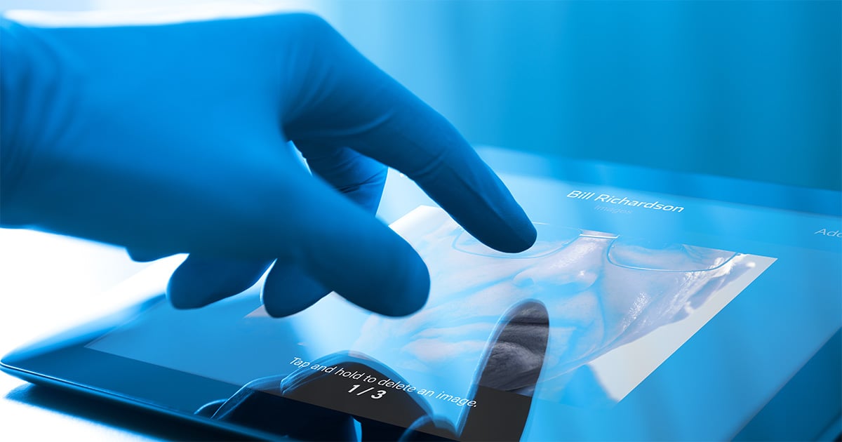 gloved-hand-ipad-telehealth